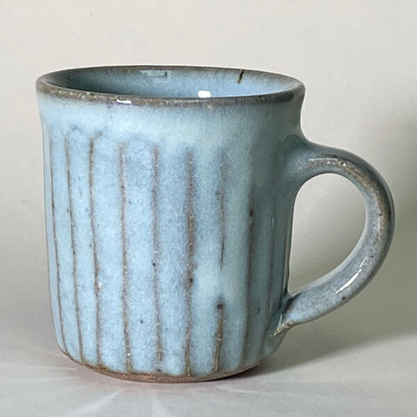 large ceramic mug with a blue glaze