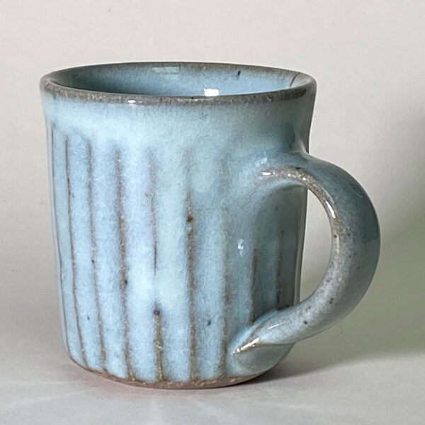 large ceramic mug with a blue glaze