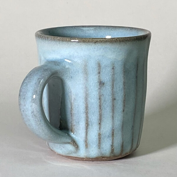 large ceramic mug with a blue glaze