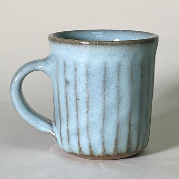 large ceramic mug with a blue glaze