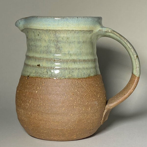 hand-made earthenware part-glazed jug